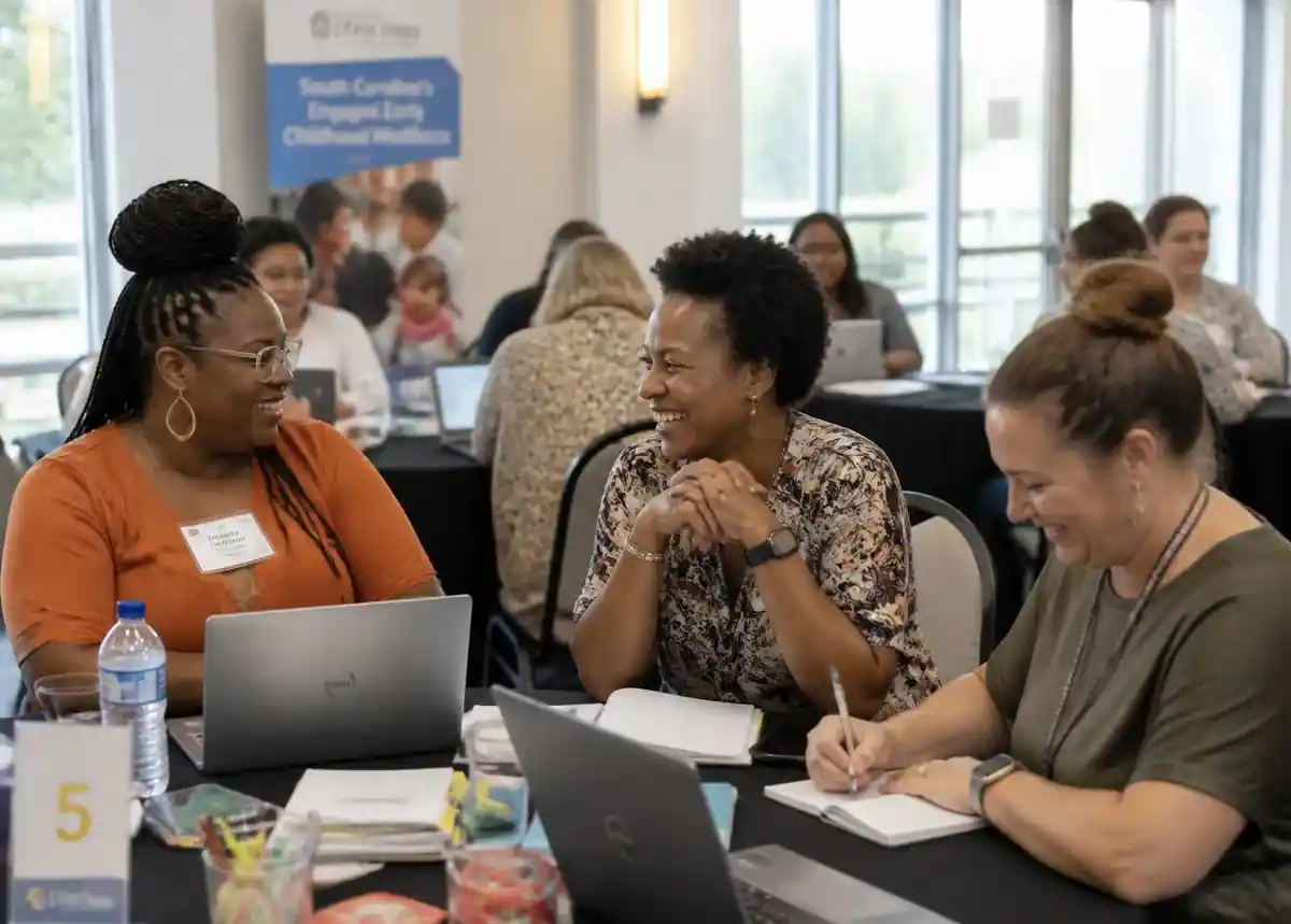 South Carolina early childhood educators smiling together during a PSSA professional development workshop